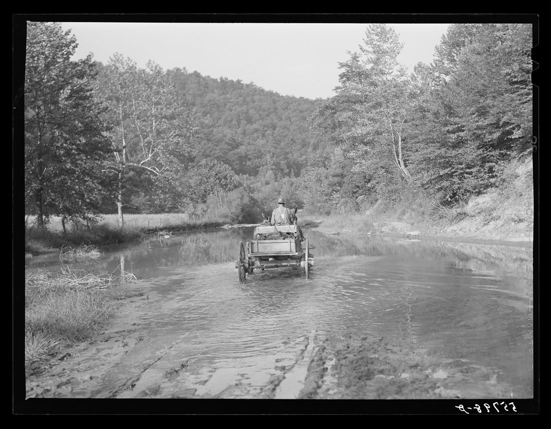 Mountaineers hauling coal up the creek bed to their homes. Morris Fork, Kentucky River near Jackson. August 1940
